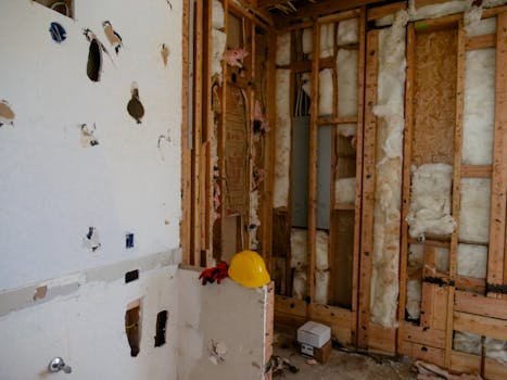 An interior space undergoing reconstruction and demolition for renovation.